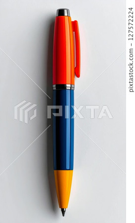 Orange Blue Yellow Pen on White Background 127572224