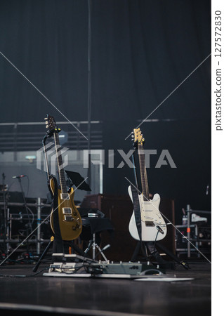 General view of two guitars on stage waiting for his players 127572830