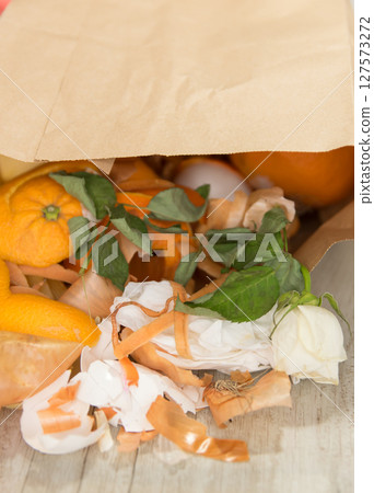 Paper bio bag for domestic food garbage. Compost waste. 127573272