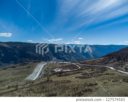 Mountain pass Katu-Yaryk. Valley of the mountain river Chulyshman. Landscape. Mountain dangerous road. 127574583