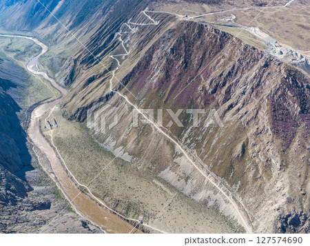 Mountain pass Katu-Yaryk. Valley of the mountain river Chulyshman. Landscape. Mountain dangerous road. Mountain pass Katu-Yaryk. Valley of the mountain river Chulyshman. Landscape. Mountain dangerous road. 127574690
