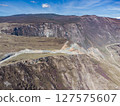 Construction of a new road to the Chulyshman River valley. Mountain pass Katu-Yaryk. Landscape. Mountain dangerous road. 127575607