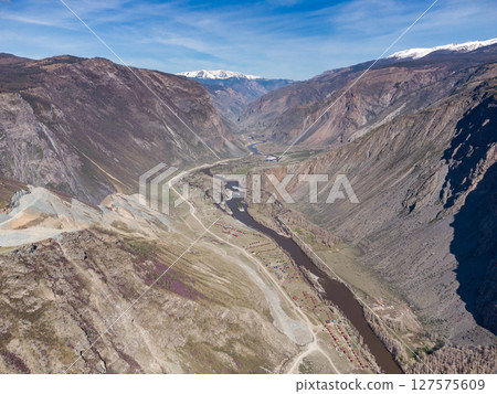 Construction of a new road to the Chulyshman River valley. Mountain pass Katu-Yaryk. Landscape. Mountain dangerous road. 127575609