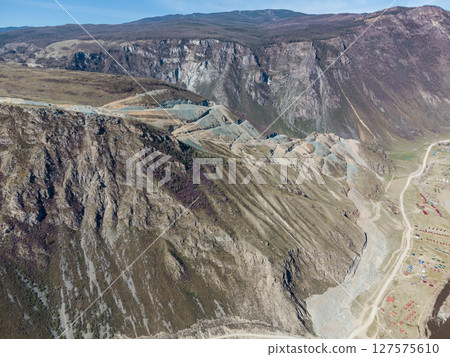 Construction of a new road to the Chulyshman River valley. Mountain pass Katu-Yaryk. Landscape. Mountain dangerous road. 127575610