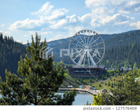 Ferris wheel in the mountains Ferris wheel in the mountains 127576409