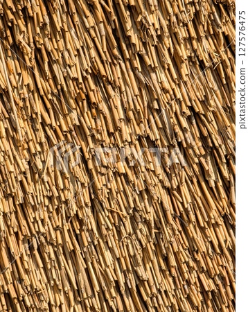 thatched roof. Straw texture close up 127576475