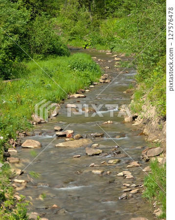 mountain river with a waterfall mountain river with a waterfall 127576478