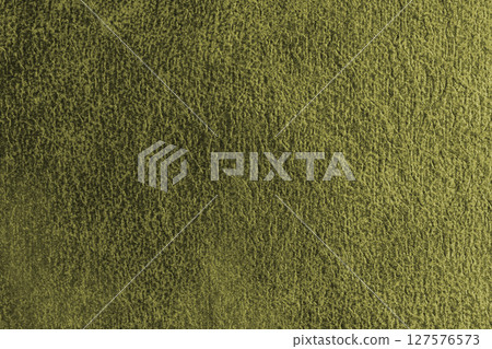Close up, macro structure of khaki suede fabric with abstract embossed shabby, messy texture. Close up, macro structure of khaki suede fabric with abstract embossed shabby, messy texture. 127576573