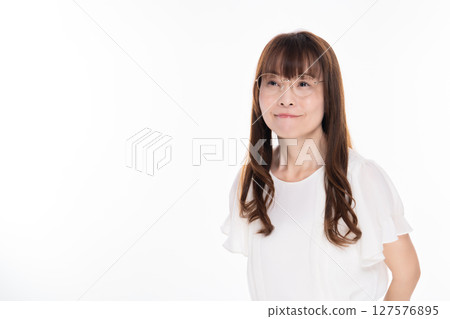 Middle-aged woman wearing glasses Middle-aged woman wearing glasses 127576895