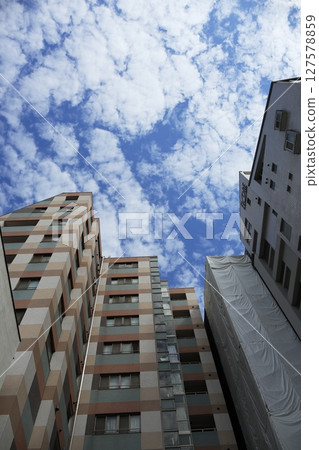 Apartment and blue sky 127578859