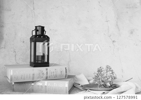 Scenery with antique lantern and books Scenery with antique lantern and books 127578991