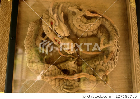 The impressive dragon sculptures at the Soryumon Gate of Haruna Shrine The impressive dragon sculptures at the Soryumon Gate of Haruna Shrine 127580719