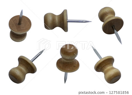 Set of wooden paper pins isolated on white background 127581856