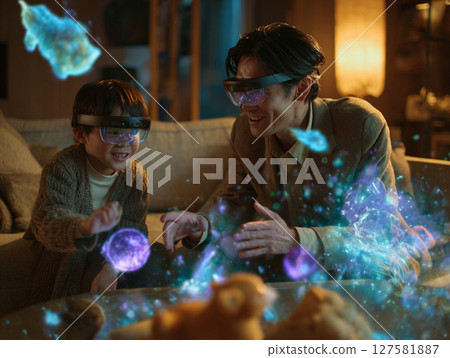 Parents and children enjoying AR glasses in the living room 127581887
