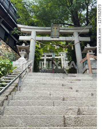 Torii gate at the entrance to Hogonji Temple and the steps leading to the temple, Chikubushima Island Torii gate at the entrance to Hogonji Temple and the steps leading to the temple, Chikubushima Island 127582073
