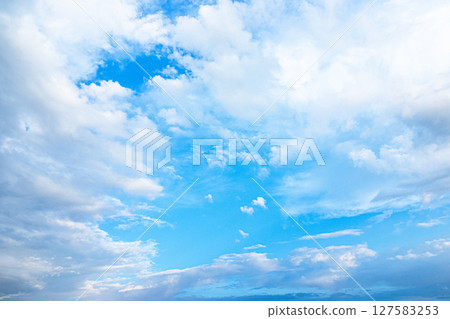 Simple landscape with blue sky and white clouds 127583253