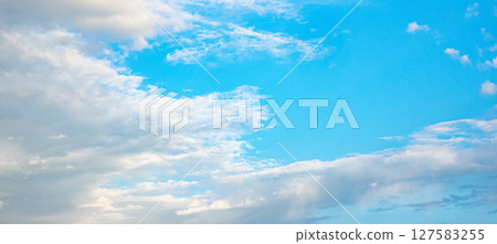 Simple landscape with blue sky and white clouds 127583255