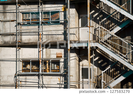 Construction site with scaffolding 127583270