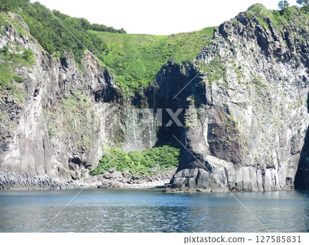 Furepe Falls (Maiden's Tears) as seen from the Shiretoko sightseeing boat Aurora Furepe Falls (Maiden's Tears) as seen from the Shiretoko sightseeing boat Aurora 127585831