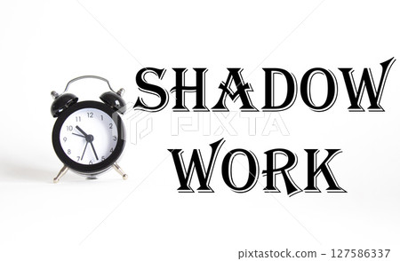 Shadow Work symbol. Concept words Shadow Work on Beautiful white background with alarm clock. Business and Shadow Work concept. Copy space. 127586337