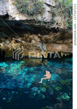 Gran Cenote, a hidden gem with exceptional transparency, located in Cancun, Mexico, Central America 127587221