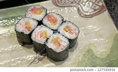 Japanese conveyor belt sushi menu (Magutaku nori rolls) Japanese conveyor belt sushi menu (Magutaku nori rolls) 127588916