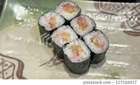 Japanese conveyor belt sushi menu (Magutaku nori rolls) 127588917