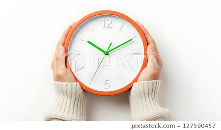 woman hands with clock 127590457