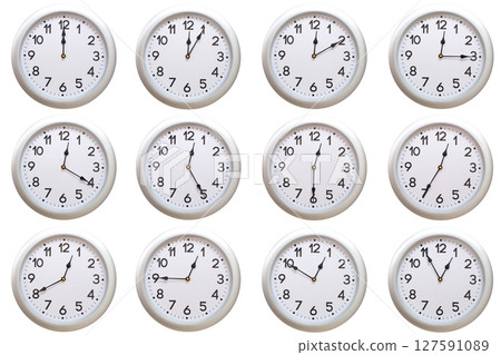 A set of 12 Round Silver Wall Clocks Showing 00:00 to 00:55 or 12:00 to 12:55 Isolated-White. Useful for concepts like noon, midnight, deadline, countdown, or time management. A set of 12 Round Silver Wall Clocks Showing 00:00 to 00:55 or 12:00 to 12:55 Isolated-White. Useful for concepts like noon, midnight, deadline, countdown, or time management. 127591089