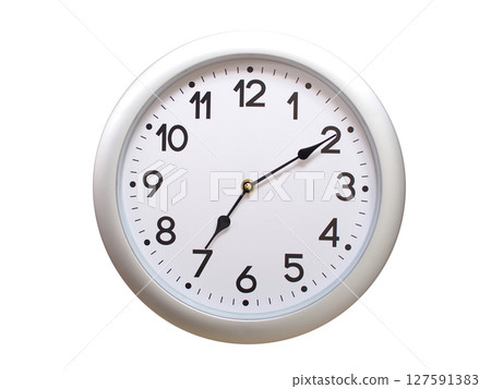 Round Silver Wall Clock Showing 07:10 or 19:10 Isolated-White. Useful for concepts like noon, midnight, deadline, countdown, or time management. Round Silver Wall Clock Showing 07:10 or 19:10 Isolated-White. Useful for concepts like noon, midnight, deadline, countdown, or time management. 127591383