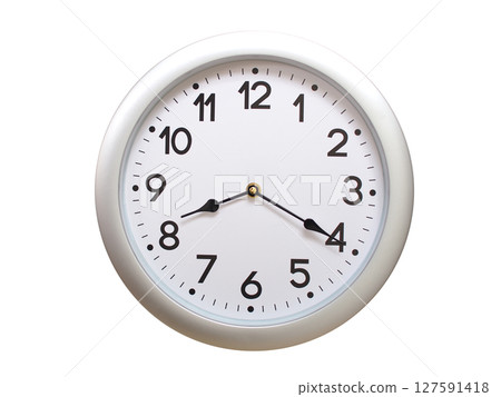 Round Silver Wall Clock Showing 08:20 or 20:20 Isolated-White. Useful for concepts like noon, midnight, deadline, countdown, or time management. 127591418