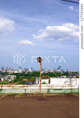 A view of the city of Sendai in summer and a convex mirror from a hill A view of the city of Sendai in summer and a convex mirror from a hill 127591684