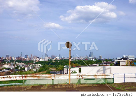A view of the city of Sendai in summer and a convex mirror from a hill A view of the city of Sendai in summer and a convex mirror from a hill 127591685