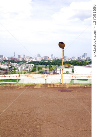 A view of the city of Sendai in summer and a convex mirror from a hill A view of the city of Sendai in summer and a convex mirror from a hill 127591686