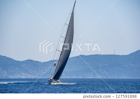 regatta boat in the wind full speed 127591898