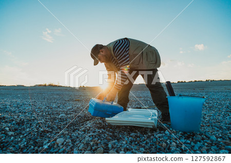 Sun Hitting The Fisherman Preparation On The Beach  127592867