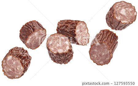 Falling Polish kielbasa slices, chopped smoked sausage isolated on white background with clipping path, full depth of field Falling Polish kielbasa slices, chopped smoked sausage isolated on white background with clipping path, full depth of field 127593550