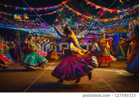 People celebrating the festival with joyful dance and heartfelt prayers to the divine, surrounded by vibrant colors and cultural rhythms 127593723