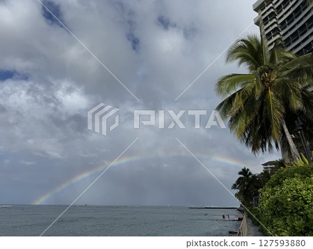 A landscape with a rainbow 127593880