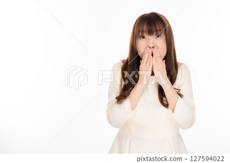 A middle-aged woman is shocked 127594022