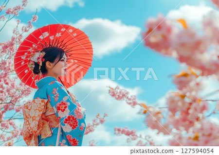 Japanese woman wear traditional dress Kimono at Cherry bossom park. 127594054