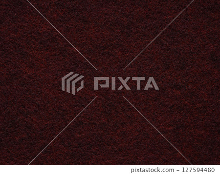 A rich tapestry of burgundy whispers elegance, the felt's texture hinting at a story woven in threads of wine and maroon A rich tapestry of burgundy whispers elegance, the felt's texture hinting at a story woven in threads of wine and maroon 127594480
