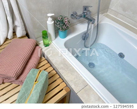 Bathroom with jacuzzi. Hydromassage and chromotherapy at home. Health care. Objects and environment. Bathroom with jacuzzi. Hydromassage and chromotherapy at home. Health care. Objects and environment. 127594595