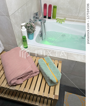 Bathroom with jacuzzi. Hydromassage and chromotherapy at home. Health care. Objects and environment. Bathroom with jacuzzi. Hydromassage and chromotherapy at home. Health care. Objects and environment. 127594596