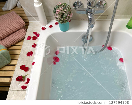 Bathroom with jacuzzi. Hydromassage and chromotherapy at home. Health care. Objects and environment. Bathroom with jacuzzi. Hydromassage and chromotherapy at home. Health care. Objects and environment. 127594598
