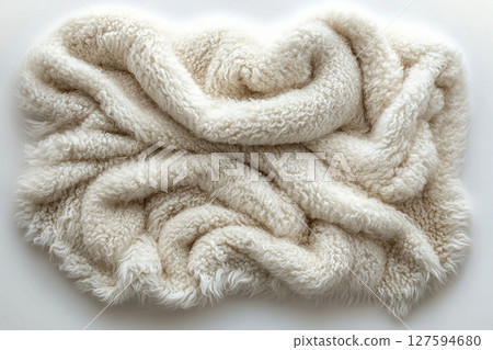Alpaca wool throw blanket on a white background. For minimalist luxury living room. 127594680