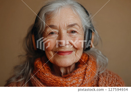 Elderly Woman In Orange Scarf Smiling Warmly 127594934