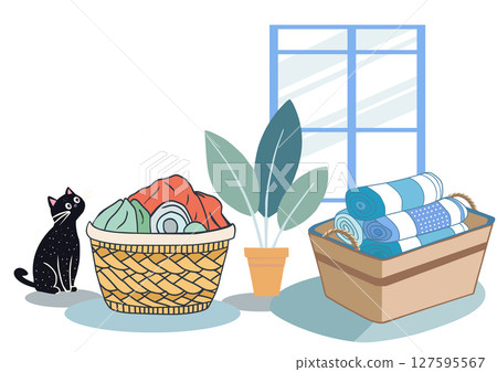 Dirty clothes in laundry baskets and a basket of clean towels next Dirty clothes in laundry baskets and a basket of clean towels next 127595567
