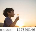 Dandelion fluff and a boy 127596146