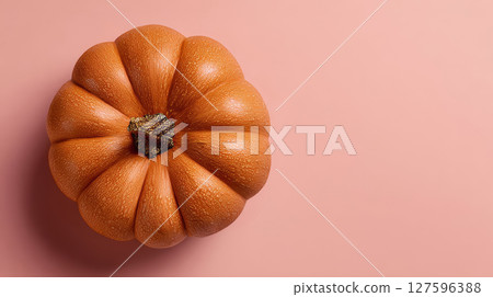 Top view of pumpkin with rich surface detail on pale pink background, high quality texture, wallpaper style 127596388